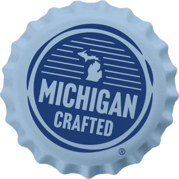 A bottle cap with the Michigan Crafted logo.