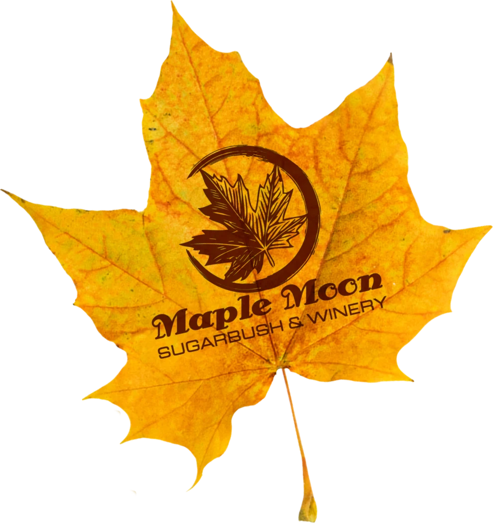 The Maple Moon Sugarbush & Winery logo on a fall leaf.